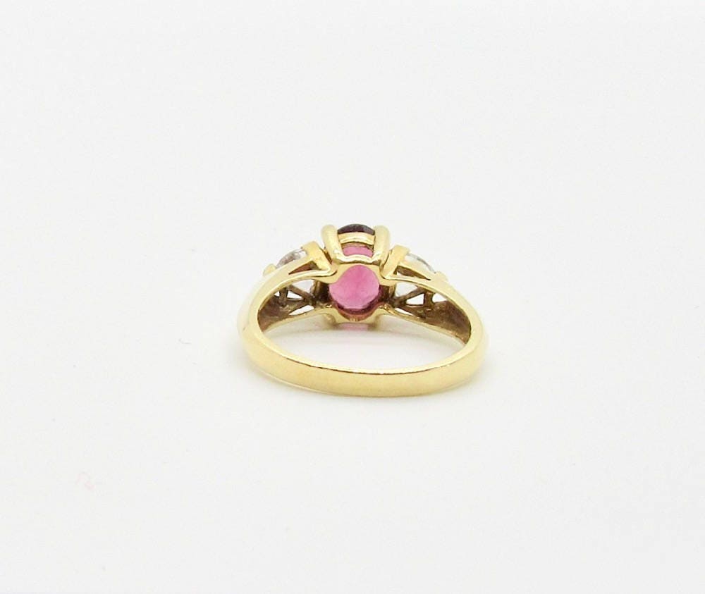 Vintage 14 karat Yellow Gold Rhodolite Garnet and Cubic Zirconia Ring