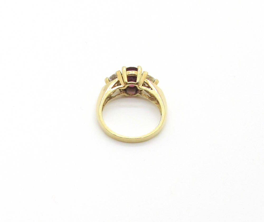 Vintage 14 karat Yellow Gold Rhodolite Garnet and Cubic Zirconia Ring