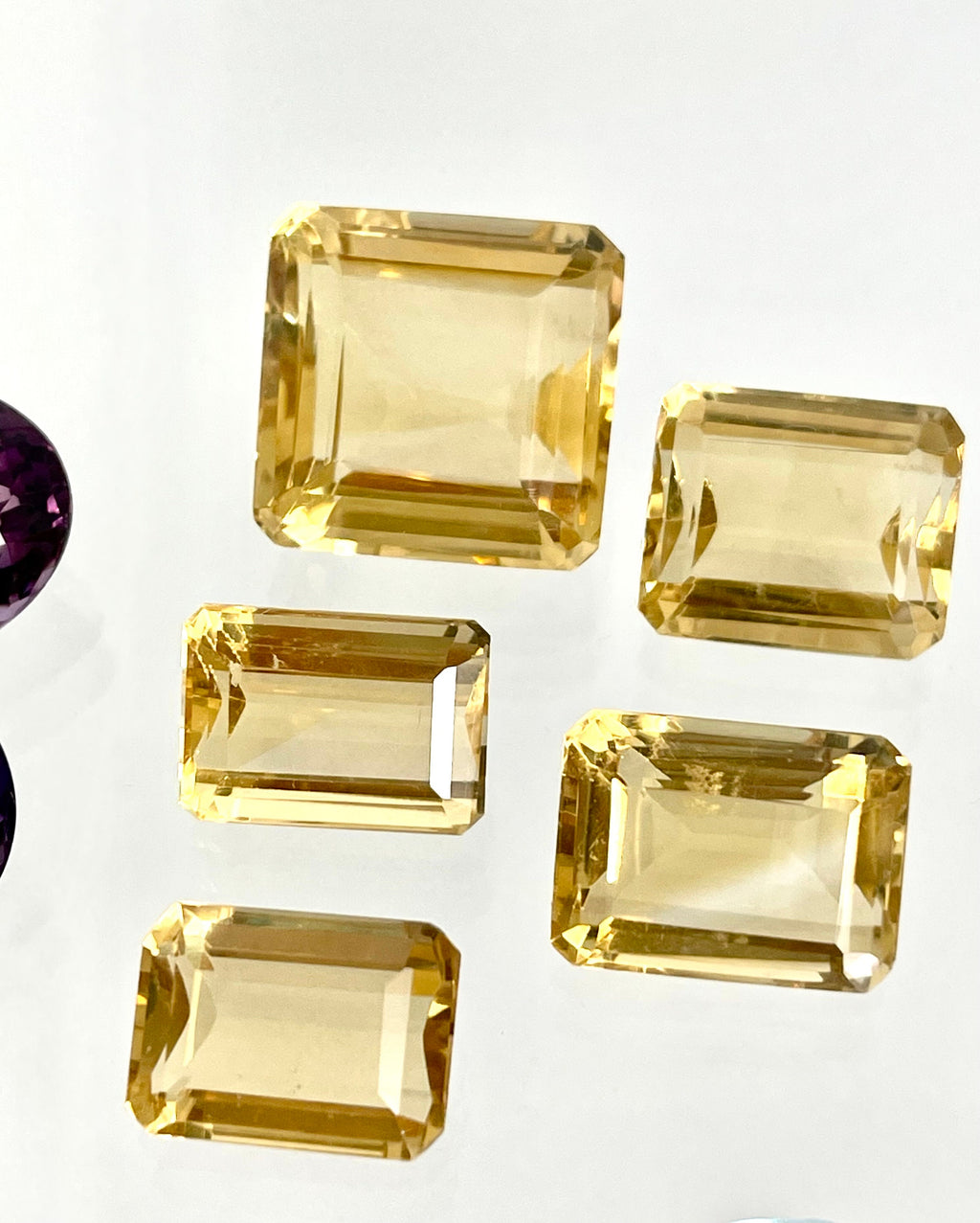 Loose Gemstone Lot: Amethyst (February Birthstone), Blue Topaz and Citrine (both November Birthstones) totalling 301.40 Carats