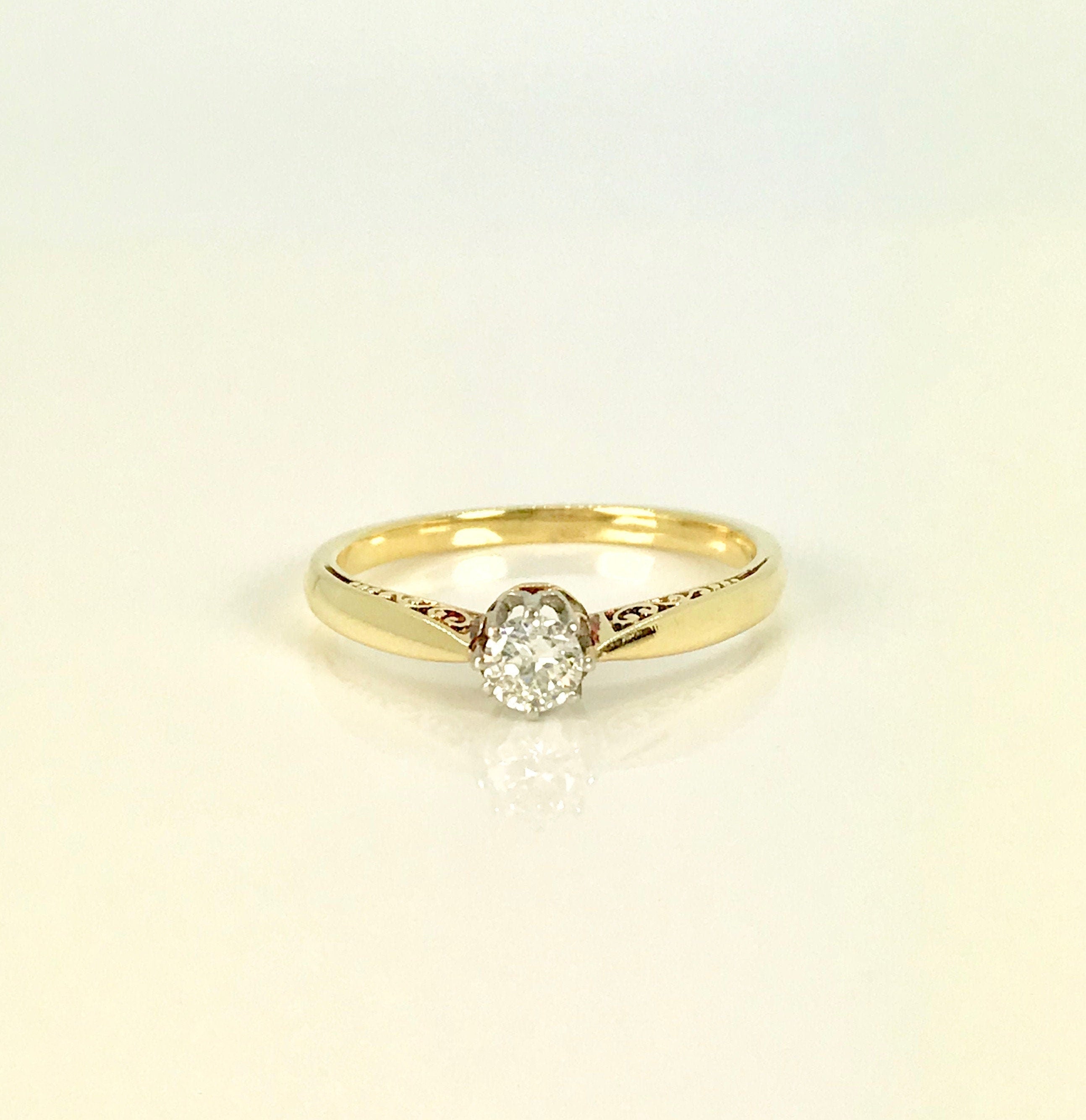 Sophisticated Yellow Gold Engagement Ring with Transitional Cut Diamond