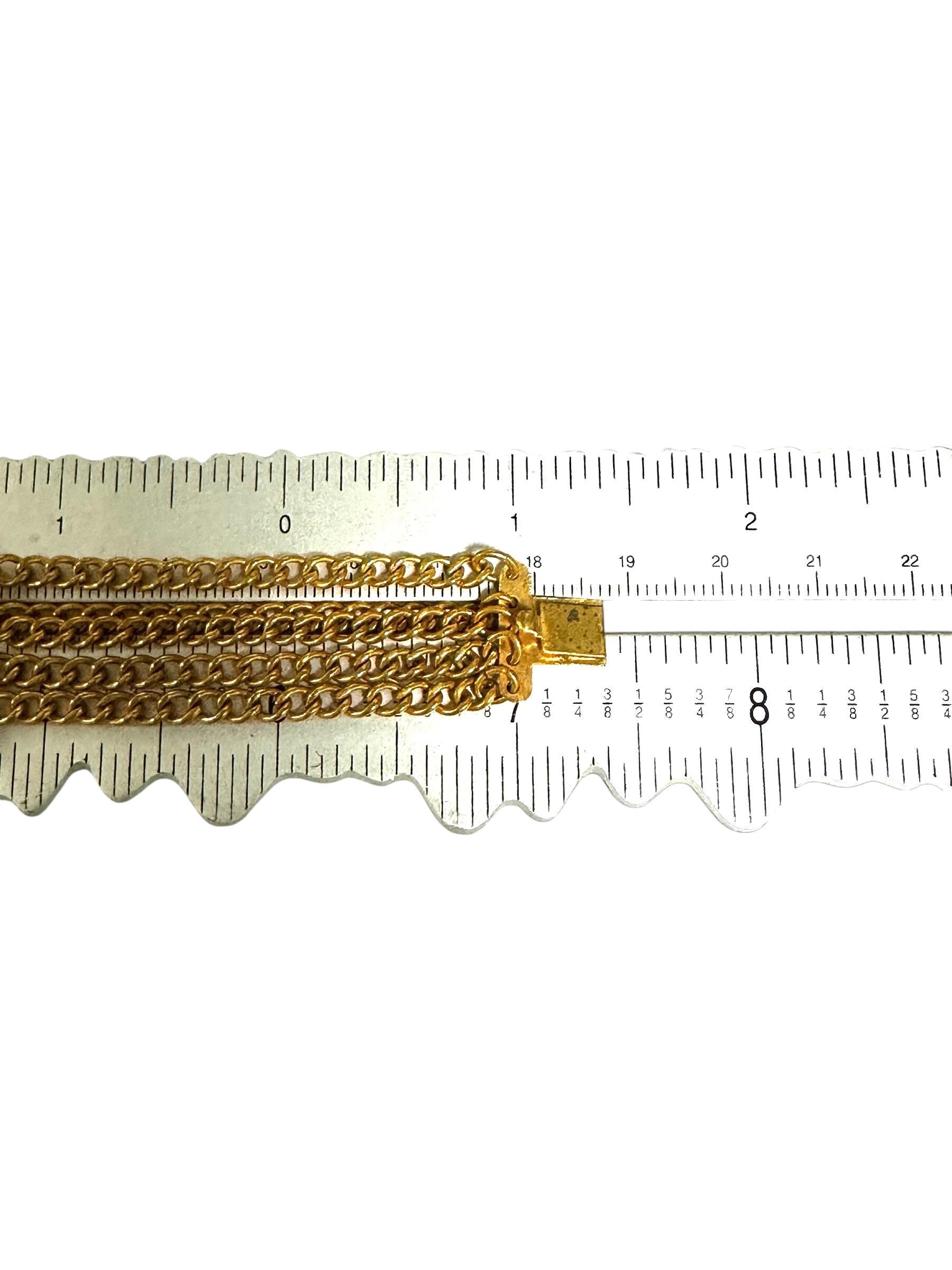 Gold Tone Marcasite Chain Bracelet with Center Flower Design and Scroll Design Clasp