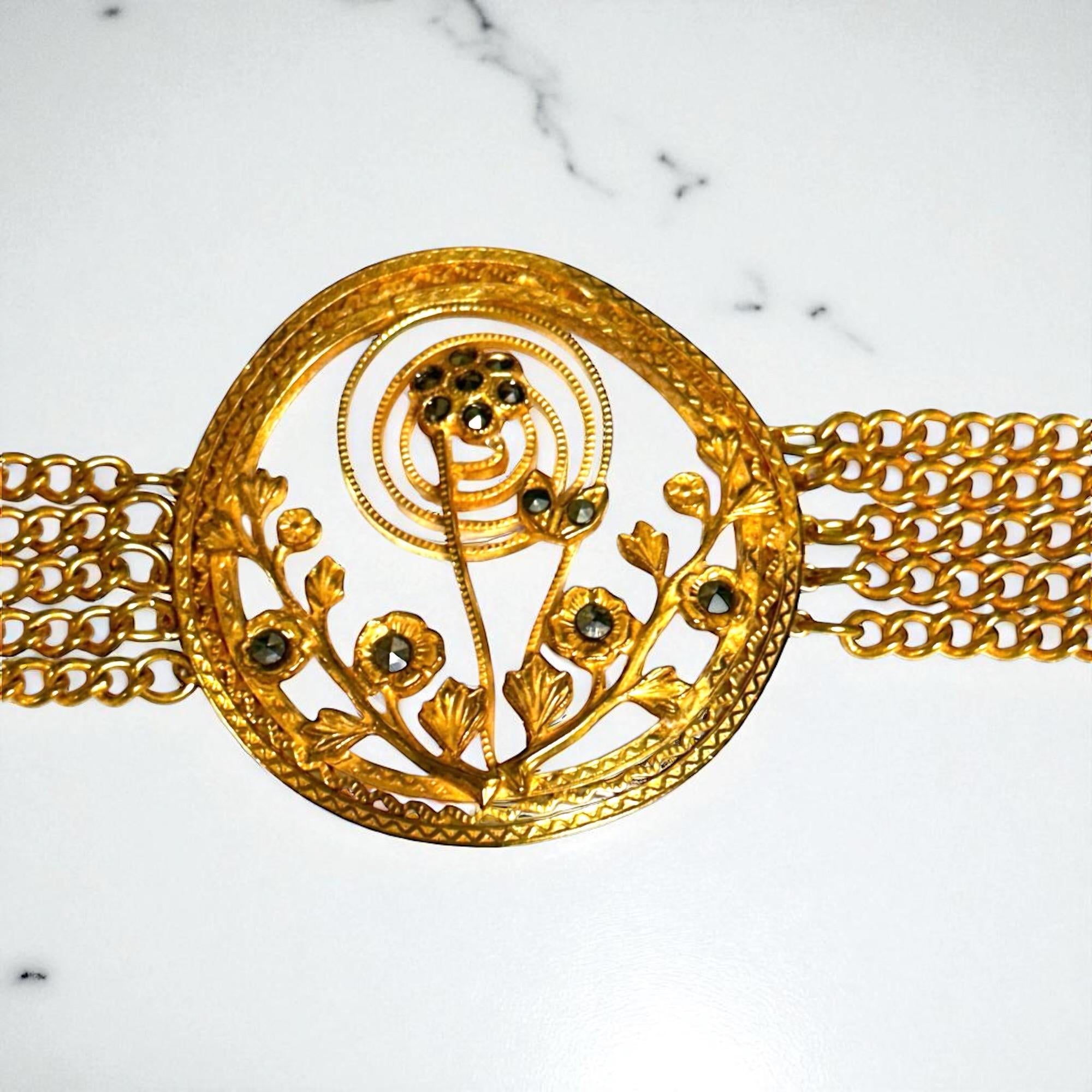 Gold Tone Marcasite Chain Bracelet with Center Flower Design and Scroll Design Clasp