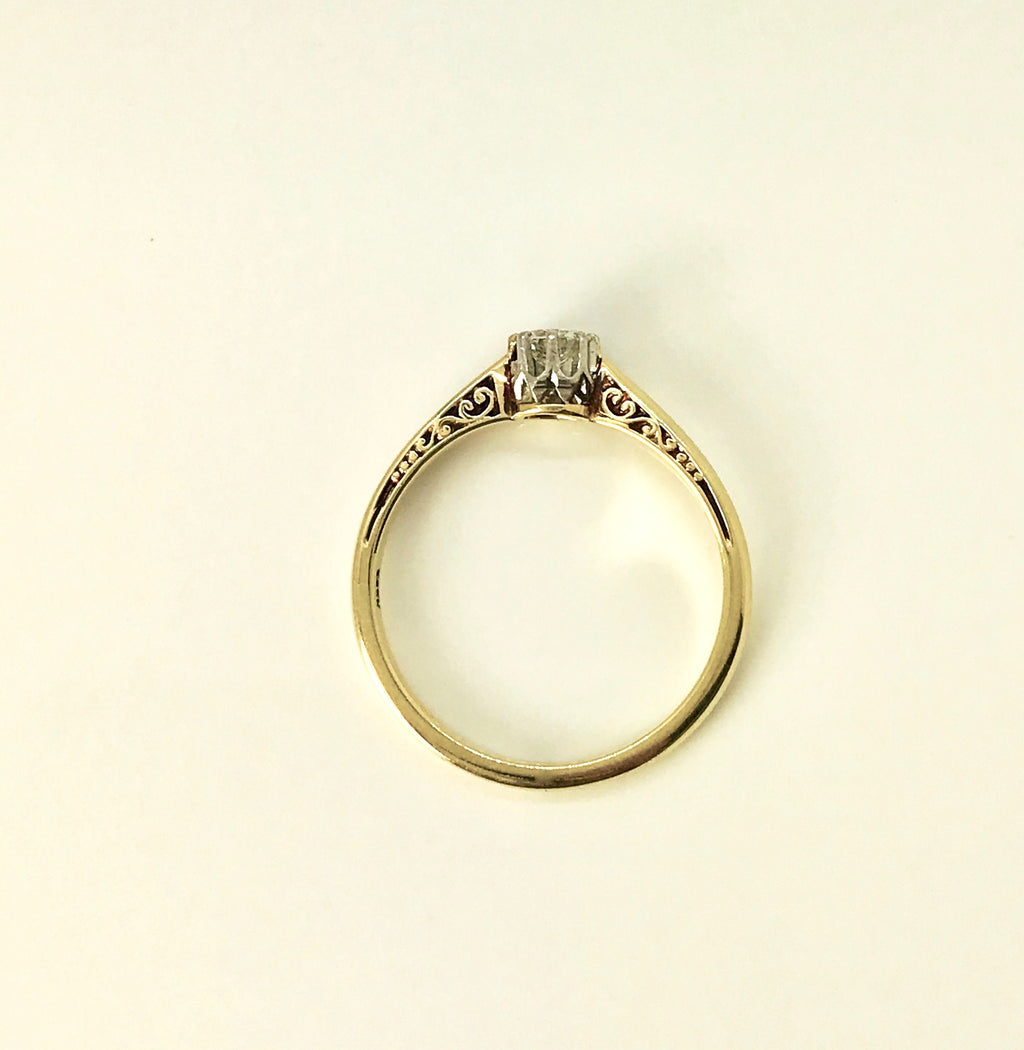 Sophisticated Yellow Gold Engagement Ring with Transitional Cut Diamond