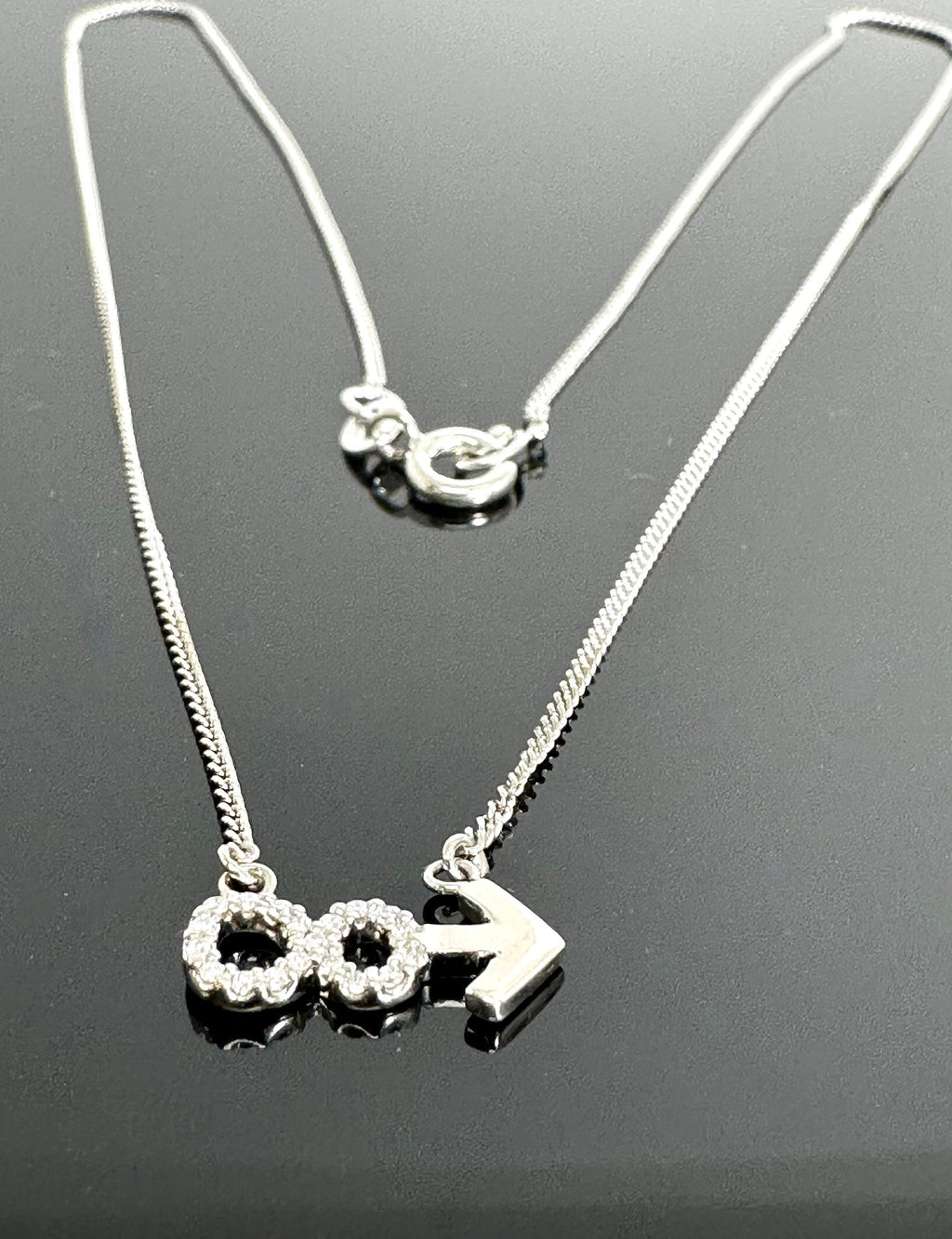 Sterling Silver Diamond Infinity and Beyond Necklace: 0.25 Carats, 20 inch Chain