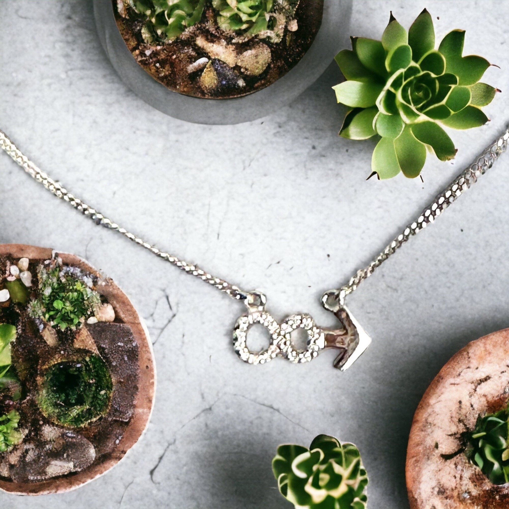 Sterling Silver Diamond Infinity and Beyond Necklace: 0.25 Carats, 20 inch Chain