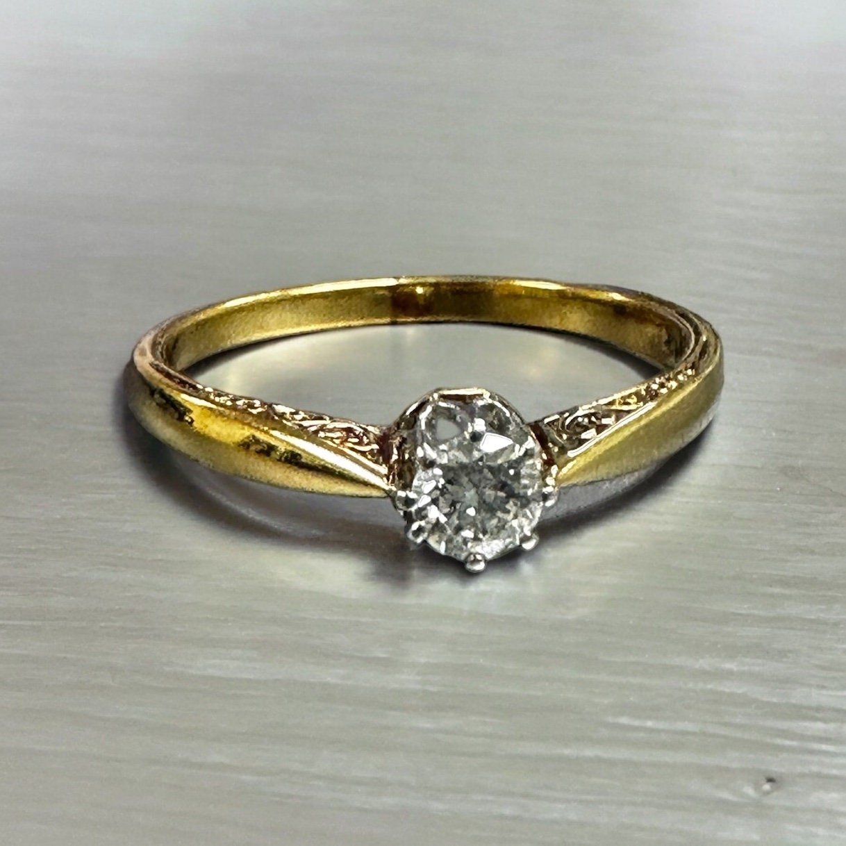 Sophisticated Yellow Gold Engagement Ring with Transitional Cut Diamond
