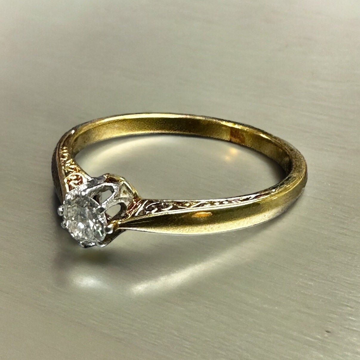 Sophisticated Yellow Gold Engagement Ring with Transitional Cut Diamond