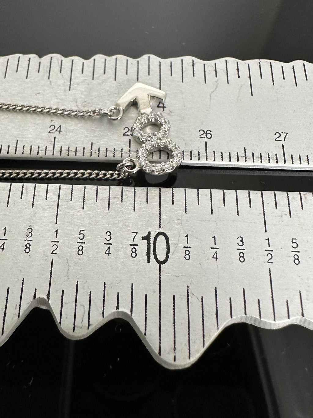 Sterling Silver Diamond Infinity and Beyond Necklace: 0.25 Carats, 20 inch Chain