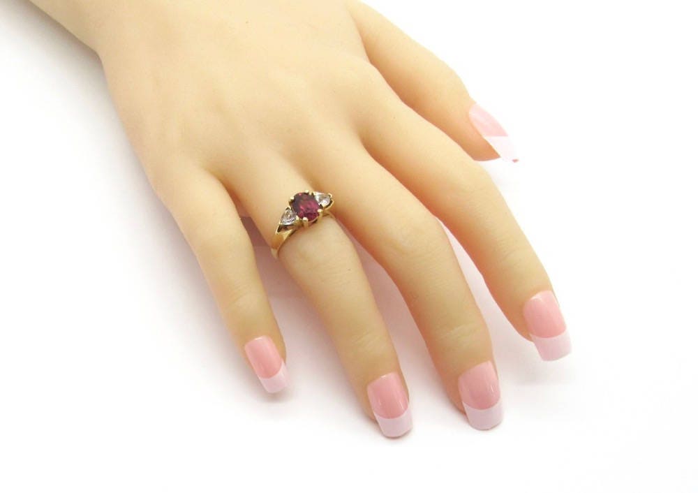 Vintage 14 karat Yellow Gold Rhodolite Garnet and Cubic Zirconia Ring