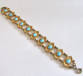 Gold Tone Art Nouveau Bracelet with Faux Turquoise
