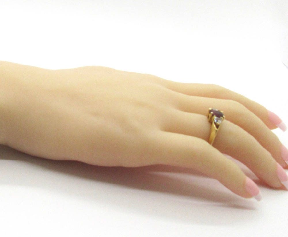 Vintage 14 karat Yellow Gold Rhodolite Garnet and Cubic Zirconia Ring