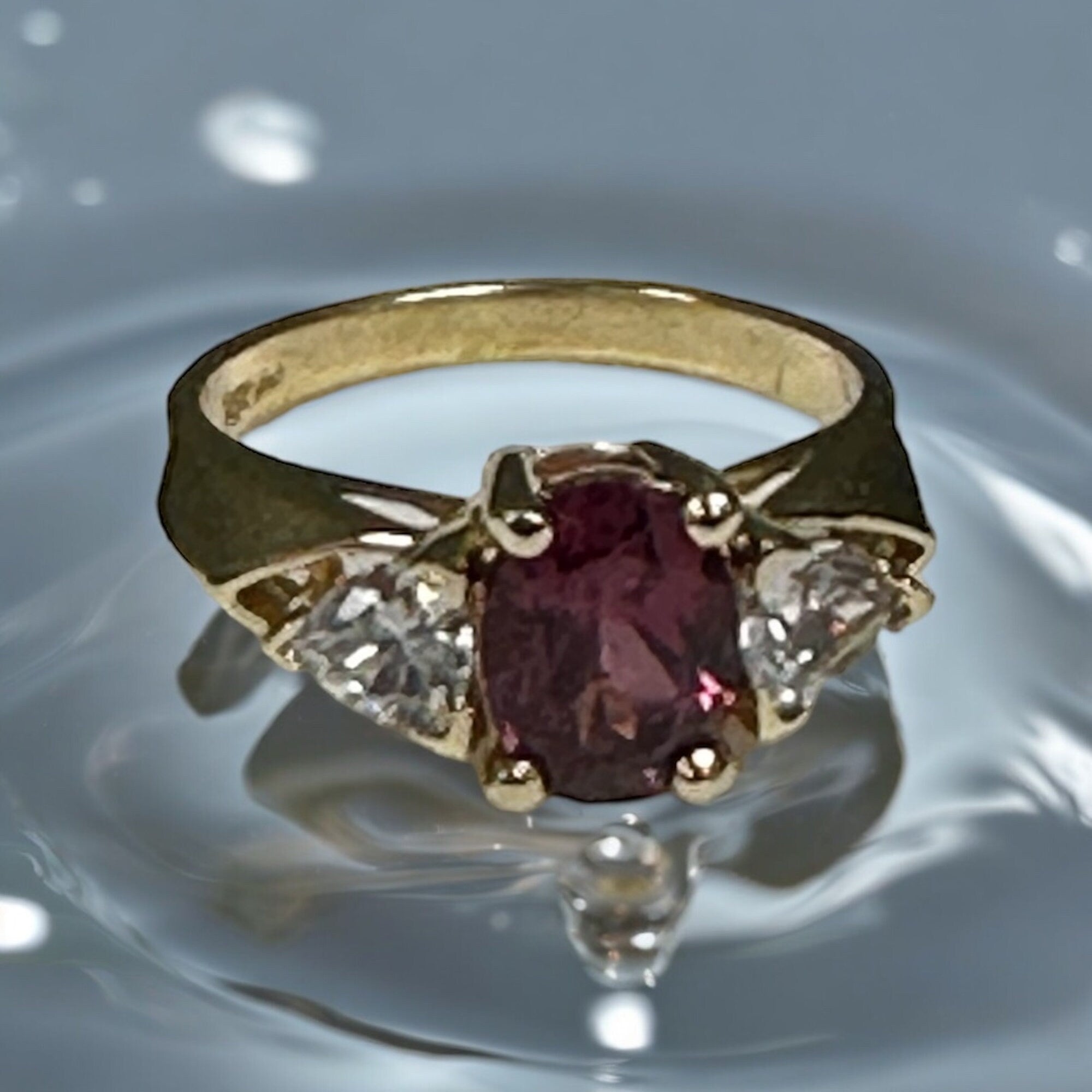 Vintage 14 karat Yellow Gold Rhodolite Garnet and Cubic Zirconia Ring