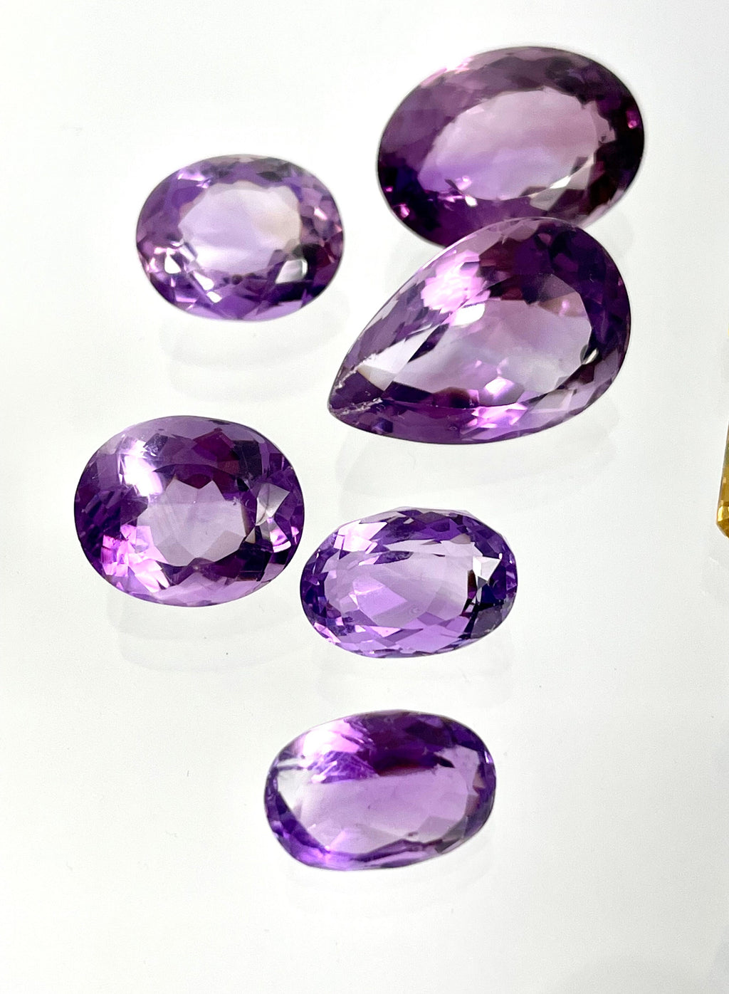 Loose Gemstone Lot: Amethyst (February Birthstone), Blue Topaz and Citrine (both November Birthstones) totalling 301.40 Carats