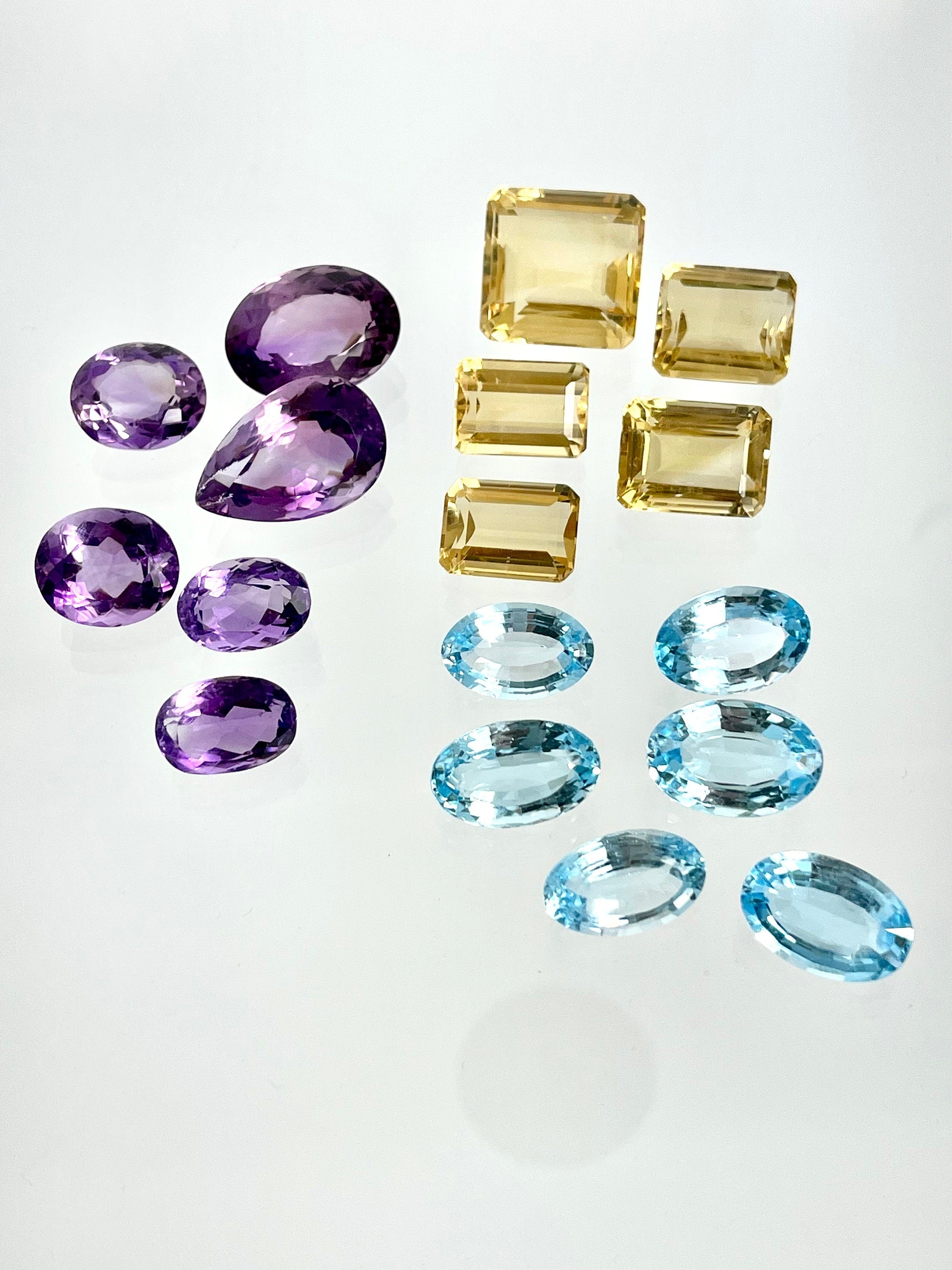 Loose Gemstone Lot: Amethyst (February Birthstone), Blue Topaz and Citrine (both November Birthstones) totalling 301.40 Carats