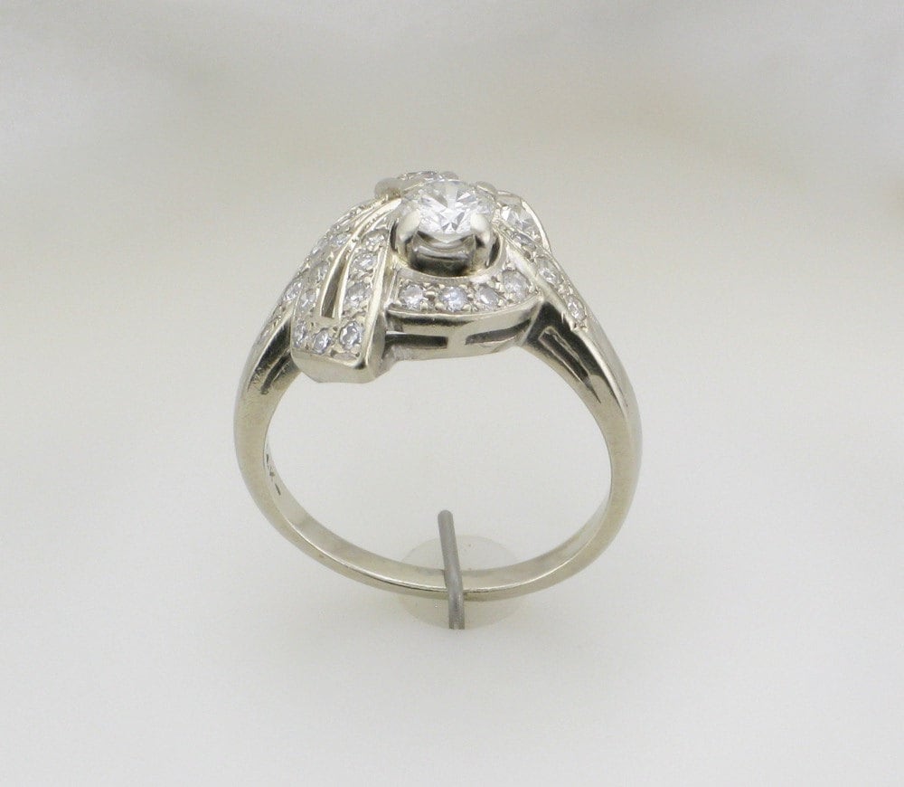 1950s White Gold Diamond Cocktail Ring: 0.34 Carat Center Stone