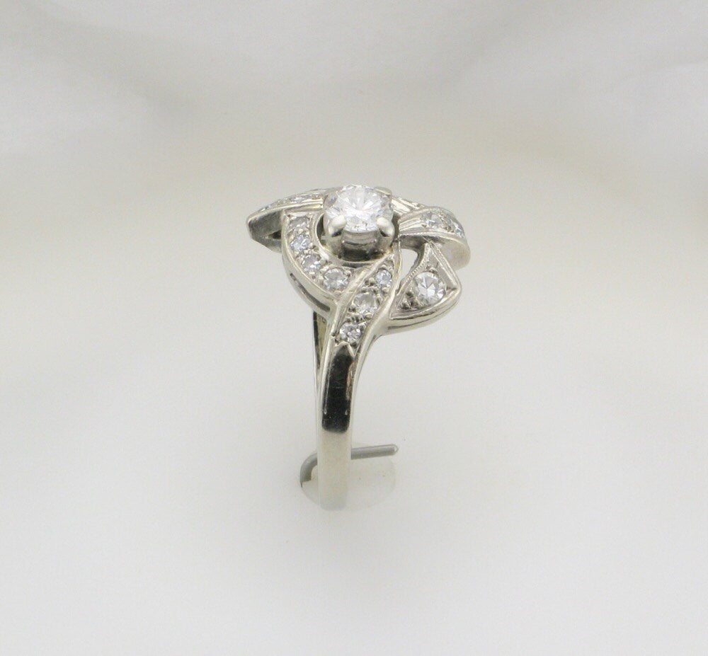 1950s White Gold Diamond Cocktail Ring: 0.34 Carat Center Stone