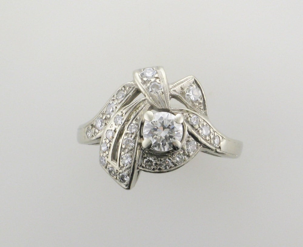 1950s White Gold Diamond Cocktail Ring: 0.34 Carat Center Stone