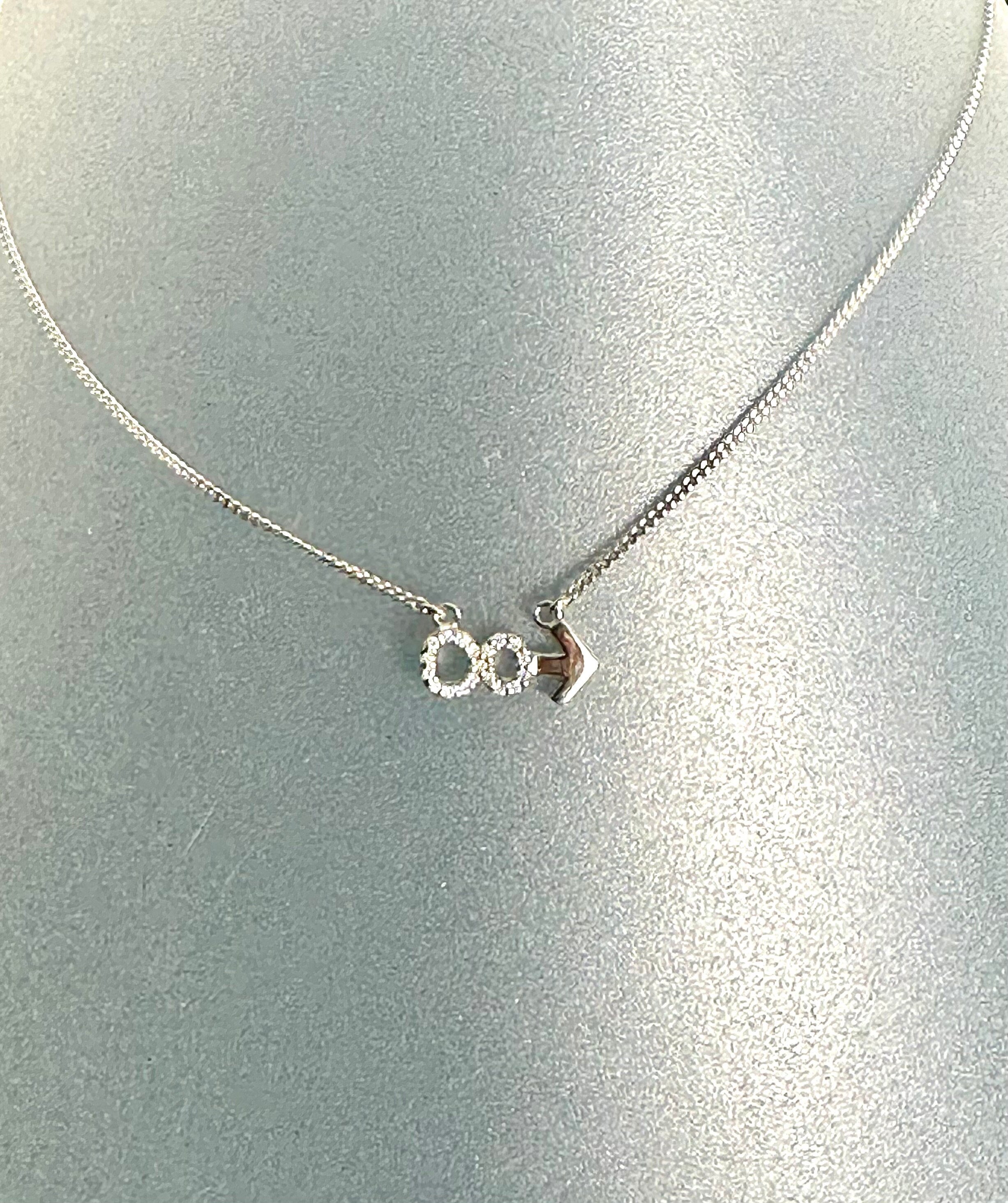 Sterling Silver Diamond Infinity and Beyond Necklace: 0.25 Carats, 20 inch Chain