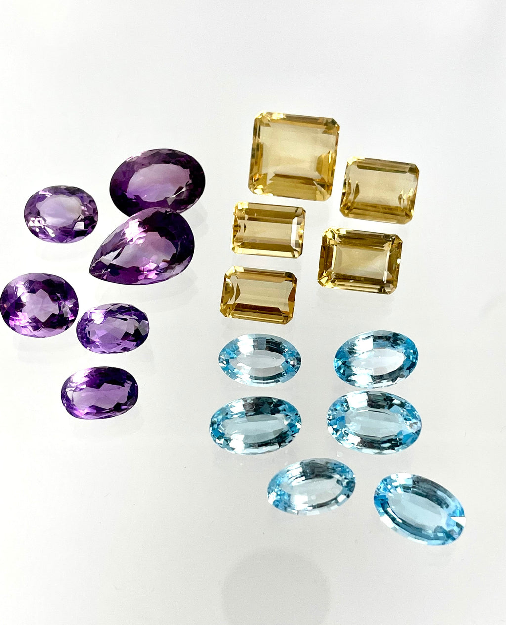 Loose Gemstone Lot: Amethyst (February Birthstone), Blue Topaz and Citrine (both November Birthstones) totalling 301.40 Carats