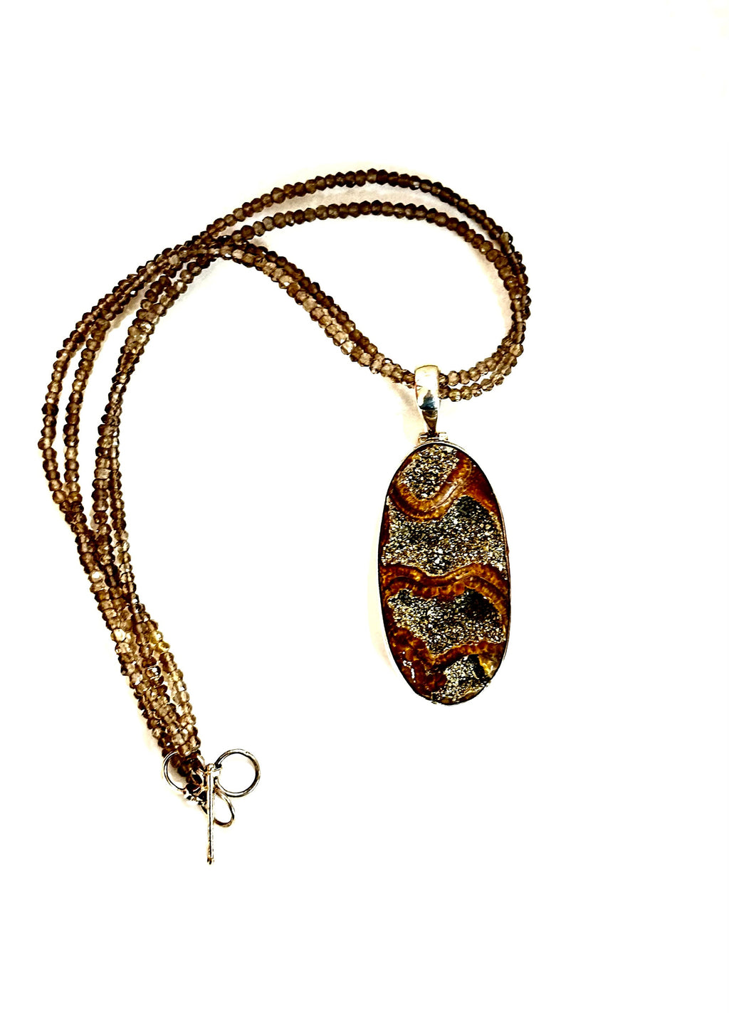 Large Ammonite set in Sterling Silver Frame,  Supported by a Smokey Quartz Necklace