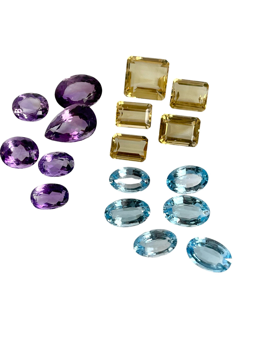 Loose Gemstone Lot: Amethyst (February Birthstone), Blue Topaz and Citrine (both November Birthstones) totalling 301.40 Carats